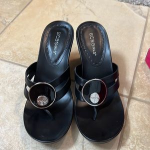 BCBGirls black wedge sandal - size 6
